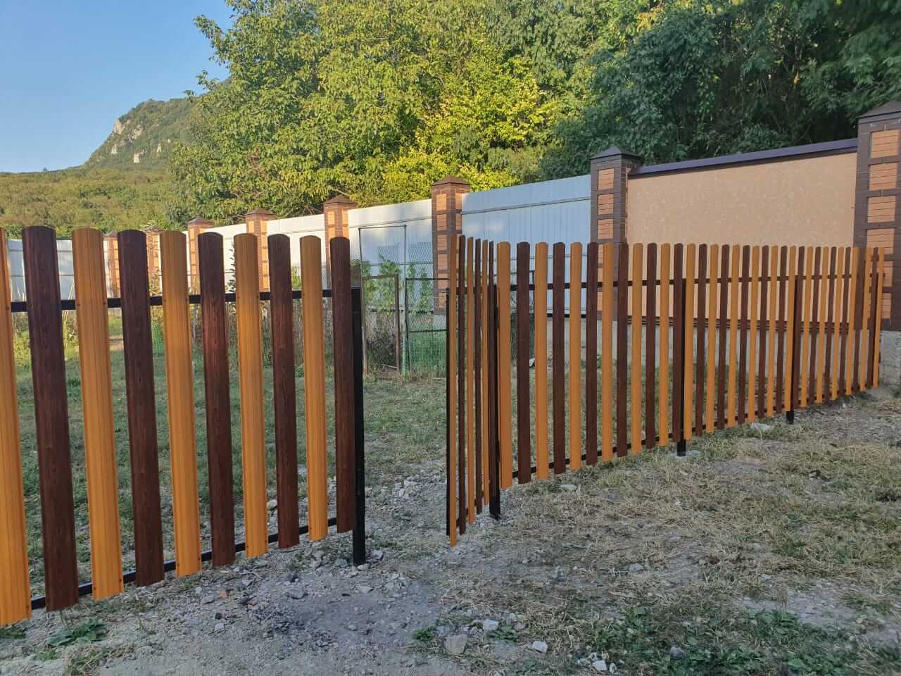 Забор из евроштакетника 10м в двух цветах: Тик + Темное Дерево Printech фото 1 в Астане